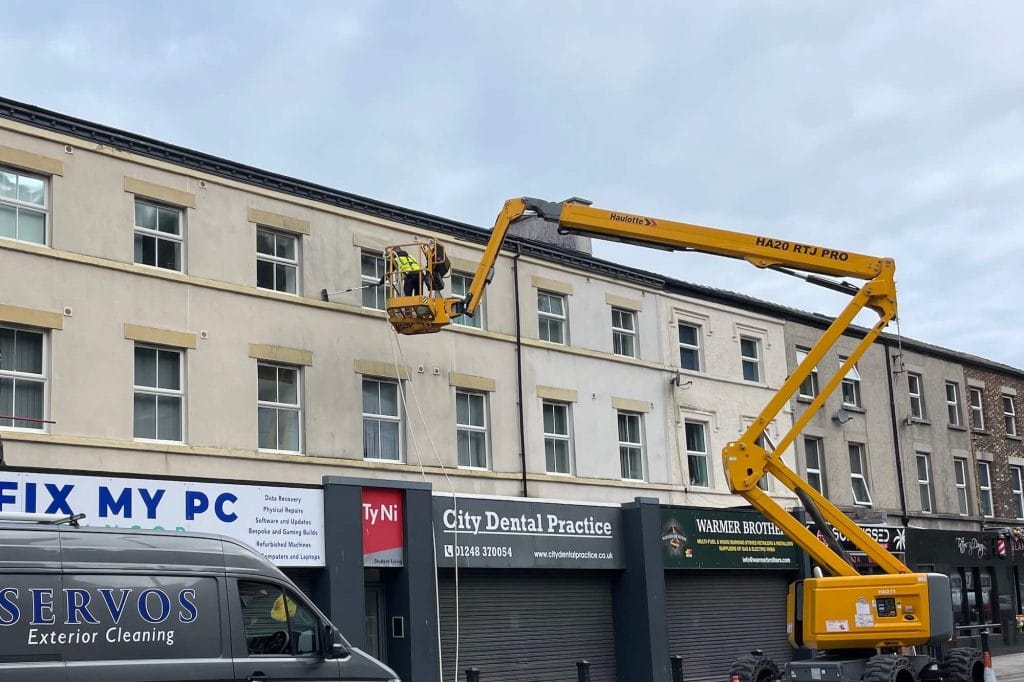 Moss, Algae, and Weather Staining: How North Wales’ Climate Impacts Your Render